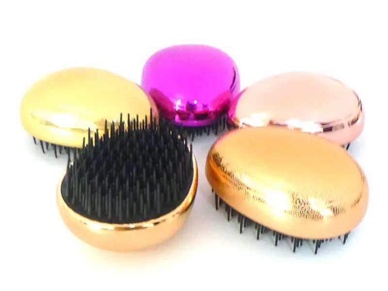 Sikat Rambut Detangling Perjalanan Berbentuk Telur Mini